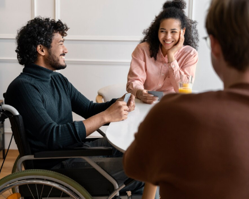 NDIS social and community participation support helping a wheelchair user connect with others and develop social confidence in Melbourne.