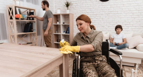 NDIS House Cleaning Services Campbellfield – NDIS participant independently cleaning table with support available at home