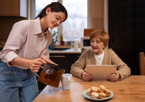 Support worker assisting an older woman with daily living activities at home in Melbourne